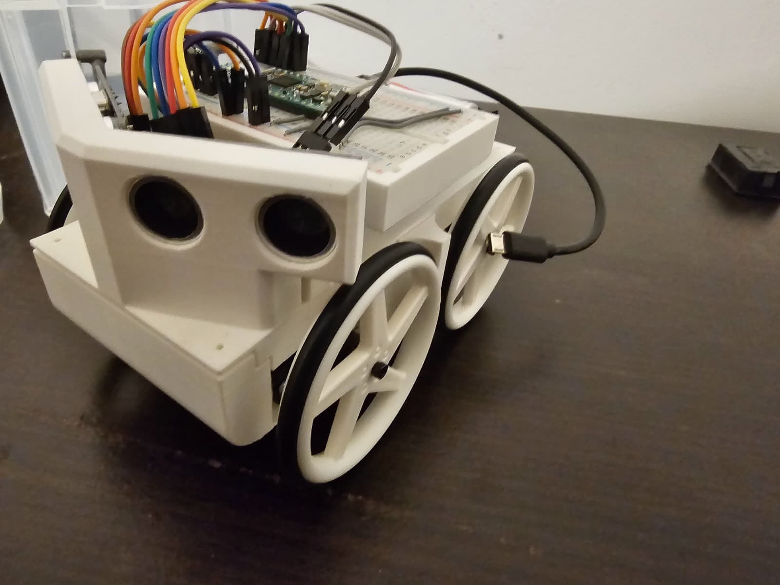 Maze robot with two ultrasonic sensors at 25 degrees